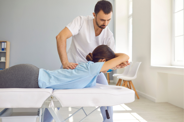 chiropractic adjustment on a female patient